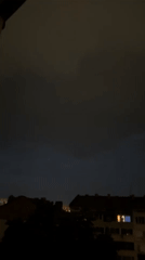 Foggy night settles over Plovdiv rooftops and trees