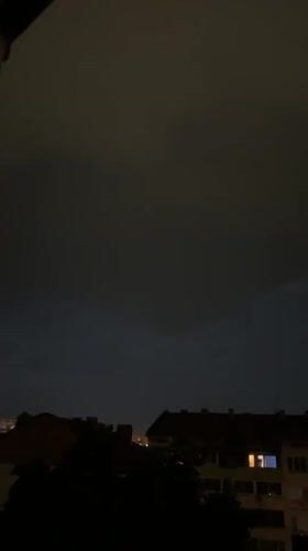 Foggy night settles over Plovdiv rooftops and trees