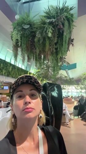 Traveler documents evening scenes at Singapore Changi Airport