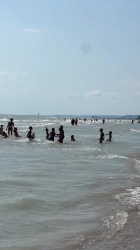 Crowded summer beach day on the Adriatic at Pineto