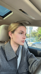 Woman drives through downtown Tbilisi streets Thursday morning