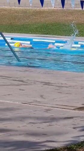 Summer morning at an outdoor pool in Sant Joan Les Fonts
