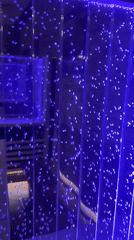 Blue-lit bubble wall display captured in Belarus village