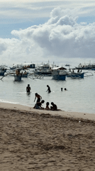 Evening beach life documented in General Luna, Philippines