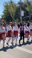 Children perform traditional Bulgarian folk dance in Pomorie streets