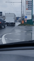 Rainy morning traffic captured from car in Varna
