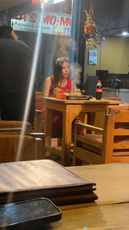 Restaurant dining and pool games captured in Pokhara