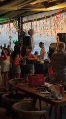 Beachside bar gathering captured in North Kuta, Indonesia