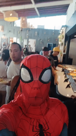 Costumed street performers entertain diners at Porlamar restaurant