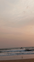 Kite surfer spotted at Arambol beach during dusk hours