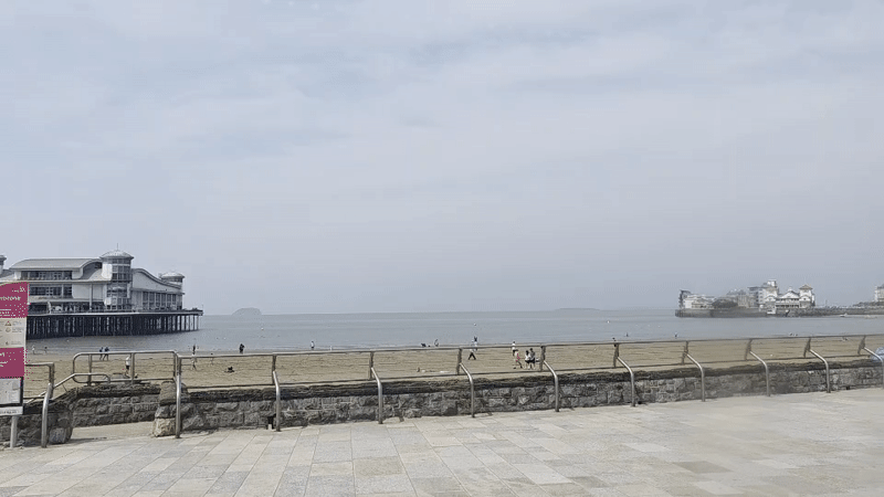 Weston-super-Mare's two piers seen from the beach