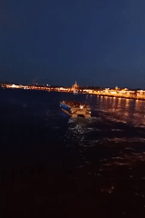 Saint Petersburg's drawbridges rise over the Neva at midsummer twilight