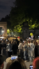 Moscow crowd records nighttime street performance with smartphones