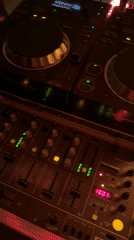DJ setup with Pioneer equipment captured playing vinyl records