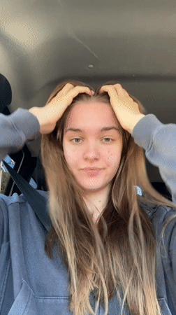 Woman observed in car driver's seat in Perm, Russia