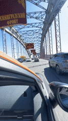 Driver crosses decorated bridge in Saint Petersburg
