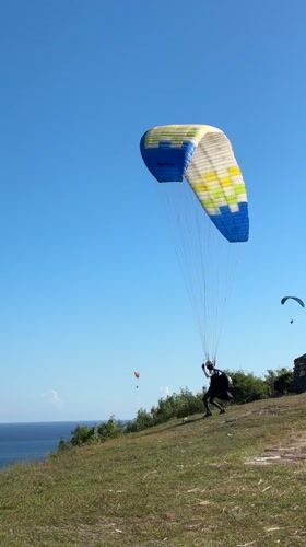 Paragliders soar over South Kuta and Benoa Indonesia