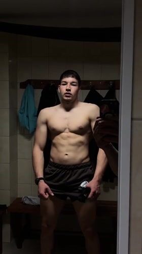 Young man's gym workout session documented in Zlatograd, Bulgaria