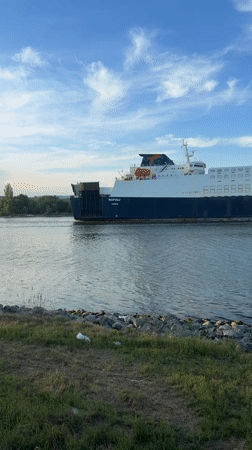 Evening life unfolds in Varna as cargo ships transit port