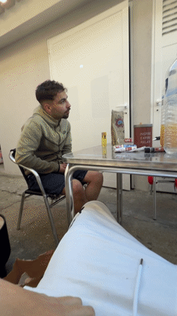 Two men spend casual time on patio in Vila Real