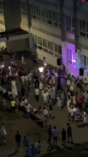 Youth dance gathering with DJ outside Kragujevac school building