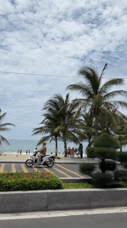 Cruising Nha Trang's beachfront road on a cloudy morning