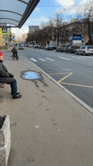 Person waits at bus stop in Sankt-Peterburg