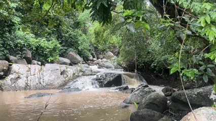 Rocky waterfall and stream documented in Baan Thong Nang