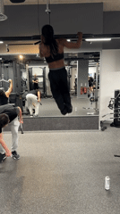 Person exercises at London gym during afternoon workout session
