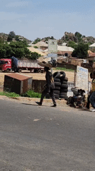 Nigerian street vendors conduct morning business in Kabong, New Stadium