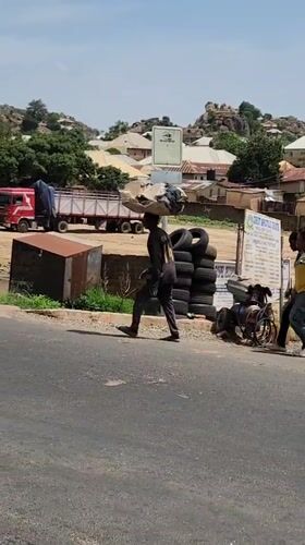 Nigerian street vendors conduct morning business in Kabong, New Stadium