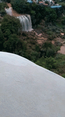 Witness captures waterfall and indoor statues in early morning