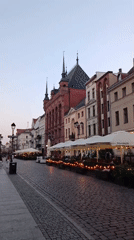Evening stroll through Toruń's Gothic Old Town square