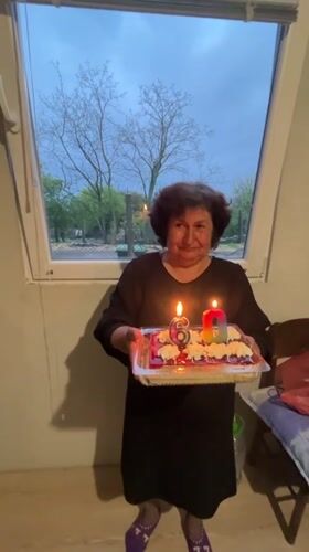 Elderly Woman Celebrates 60th Birthday in Kosten, Bulgaria