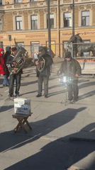 Street musicians and sunny scenes documented across Saint Petersburg