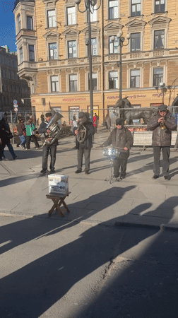 Street musicians and sunny scenes documented across Saint Petersburg
