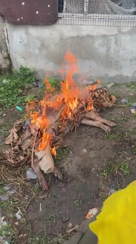 Controlled outdoor burning documented in Badagry residential area
