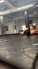 MMA training session captured at Perm gym