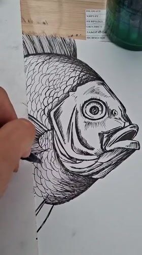 Artist creates detailed fish drawing in Kempelevo, Russia