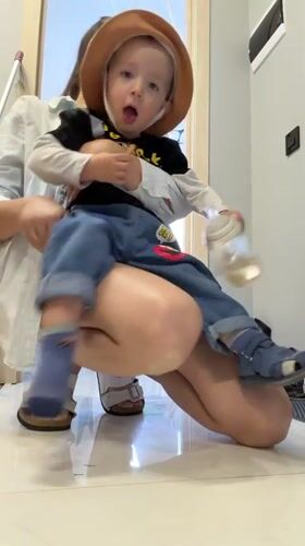 Woman with toddler observed indoors in Odintsovo, Russia