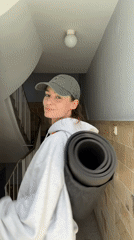 Woman takes selfies in Kiel building stairwell and elevator