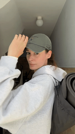 Woman takes selfies in Kiel building stairwell and elevator