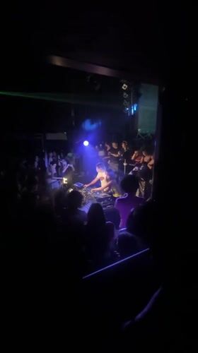 DJ duo performs for crowd at Paris venue