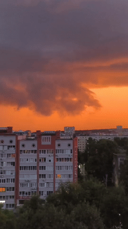 Dramatic storm-tinged sunset lights up Izhevsk's residential skyline