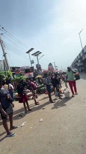 Busy street market documented in Nkpor, Nigeria Friday afternoon