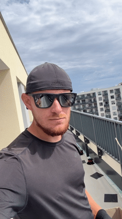 Selfie on a Prague balcony, work gloves still on