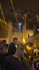 Late-night club scene captured in Paris with dancing crowds
