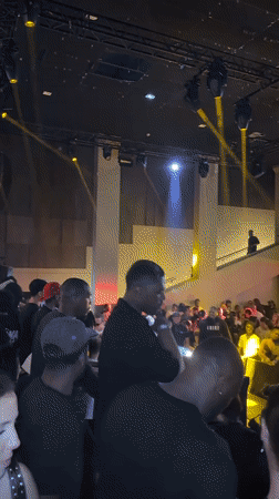 Late-night club scene captured in Paris with dancing crowds