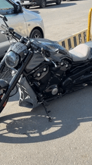 Custom Harley-Davidson V-Rod spotted in daylight parking area