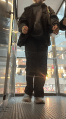 Indoor scenes captured in Odesa: elevator pose, manga collection